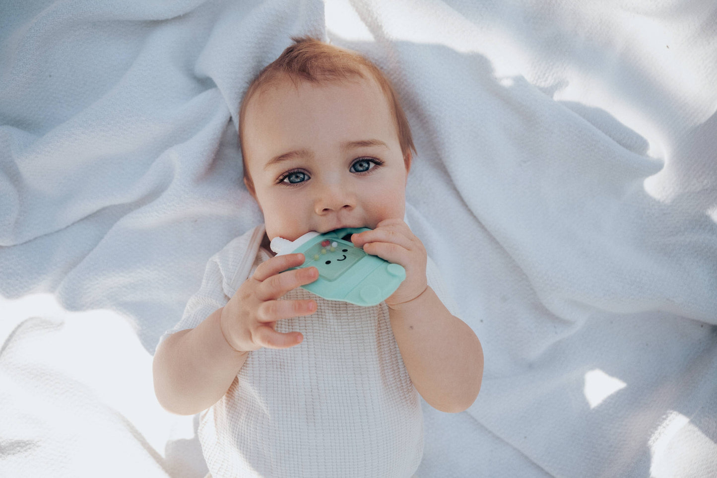 Itzy Ritzy - Teething + Rattle Toy