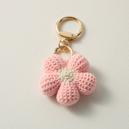 Analyzing image     Hand-Knitted-Pink-Flower-Keychain