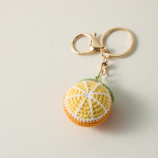 Analyzing image     Hand-Knitted-lemon-Keychain