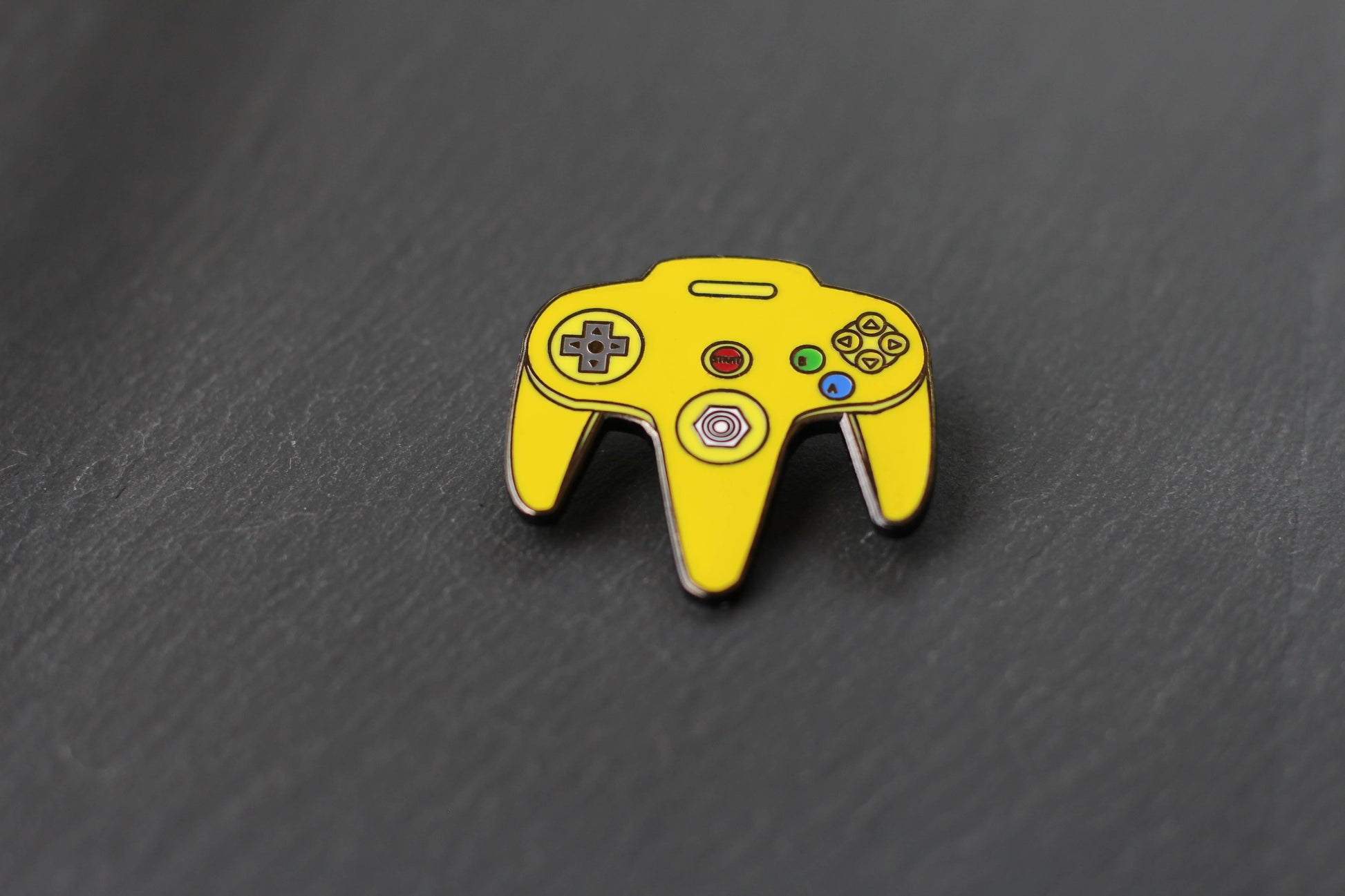 Image of Real Sic Yellow N64 Video Game Controller – Nintendo Enamel Pin