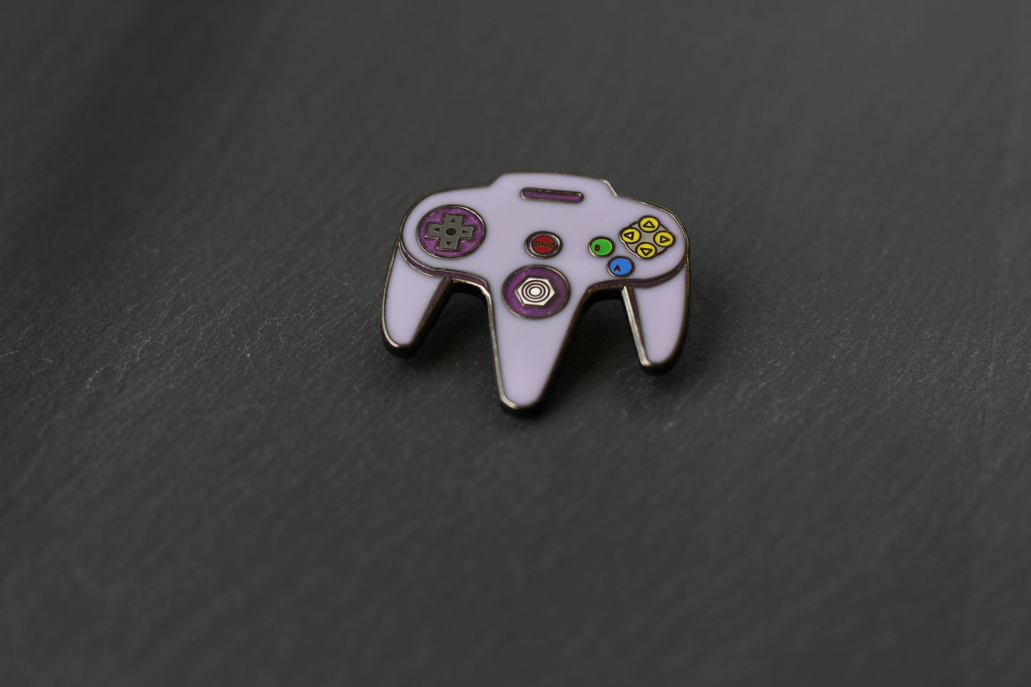 Image of Real Sic Purple N64 Video Game Controller – Nintendo Enamel Pin